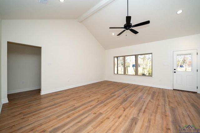 unfurnished living room featuring light wood-type flooring, vaulted ceiling with beams, and ceiling fan