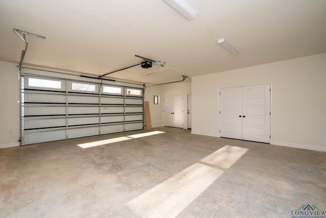 garage featuring a garage door opener