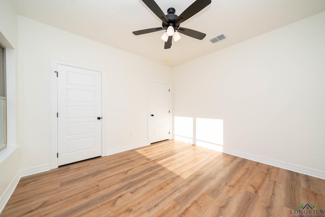 unfurnished bedroom with light wood-type flooring and ceiling fan