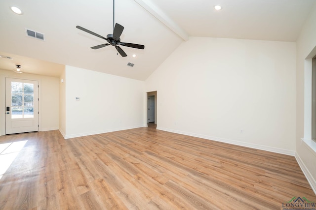 empty room featuring ceiling fan, beamed ceiling, light hardwood / wood-style flooring, and high vaulted ceiling