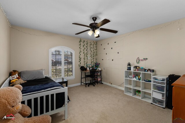 327 Forest Hls, Hallsville, TX 75650 - carpeted bedroom with a ceiling fan and baseboards