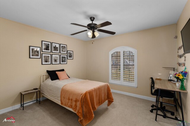 327 Forest Hls, Hallsville, TX 75650 - bedroom featuring light carpet, a desk, and ceiling fan