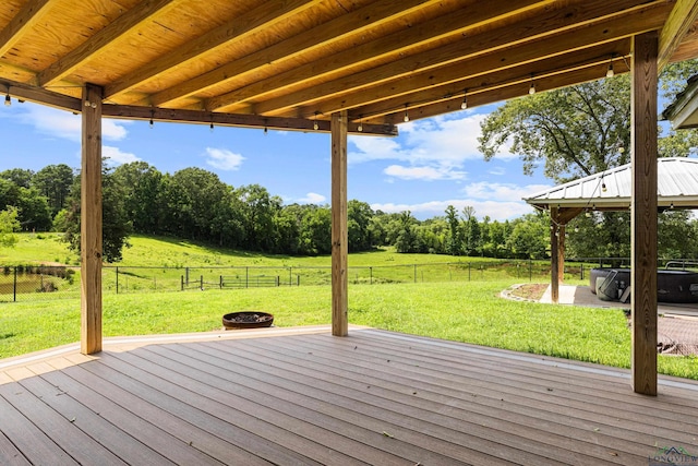 7356 Fm 49, Gilmer, TX 75644 - deck with a gazebo, a rural view, a fenced backyard, and view of scattered trees