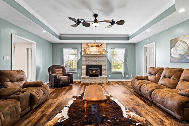 7356 Fm 49, Gilmer, TX 75644 - living area featuring a raised ceiling, wood finished floors, plenty of natural light, and recessed lighting