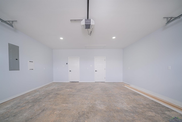 garage featuring electric panel and a garage door opener