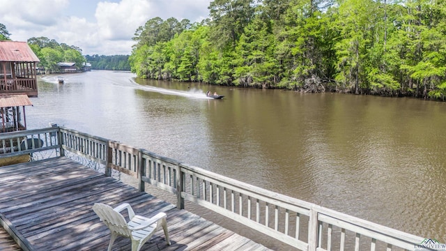 dock area featuring a water view