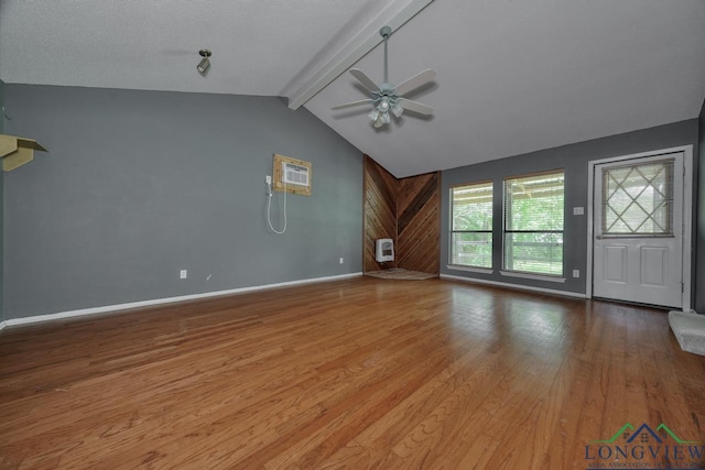 324 Highlander Hts, Hideaway, TX 75771 - unfurnished living room with wood finished floors, a ceiling fan, baseboards, heating unit, and a wall mounted AC