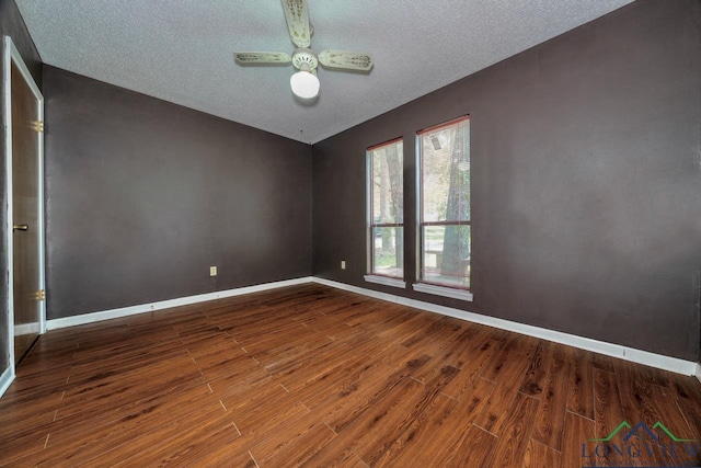 324 Highlander Hts, Hideaway, TX 75771 - empty room with wood finished floors, ceiling fan, a textured ceiling, and baseboards