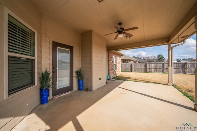 view of patio featuring ceiling fan