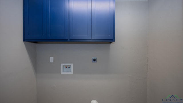 laundry area featuring electric dryer hookup, cabinets, and washer hookup