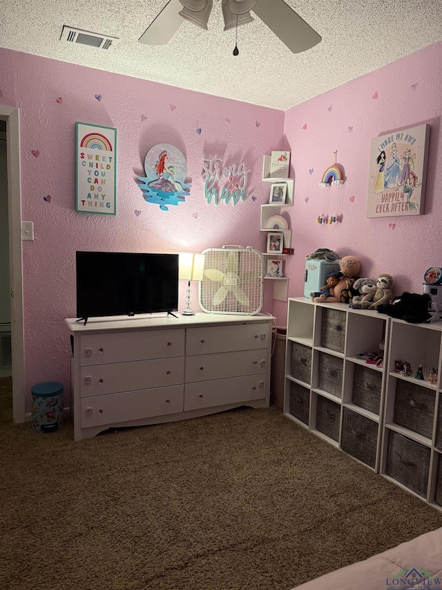1101 Rolling Hls, Longview, TX 75604 - carpeted bedroom featuring a textured ceiling and ceiling fan