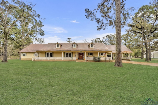 back of property with a porch and a lawn