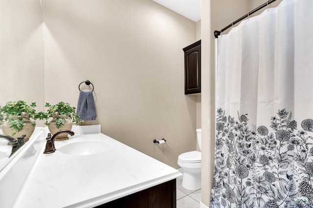 107 Lakeway Ln, Longview, TX 75604 - bathroom with toilet, vanity, tile patterned floors, and a shower with shower curtain