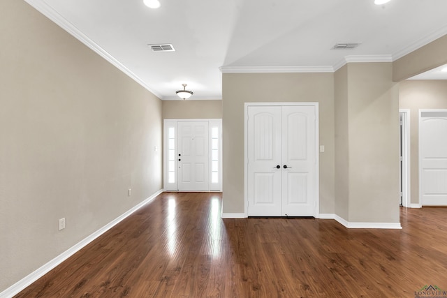 107 Lakeway Ln, Longview, TX 75604 - entryway with crown molding, baseboards, and dark wood-style floors