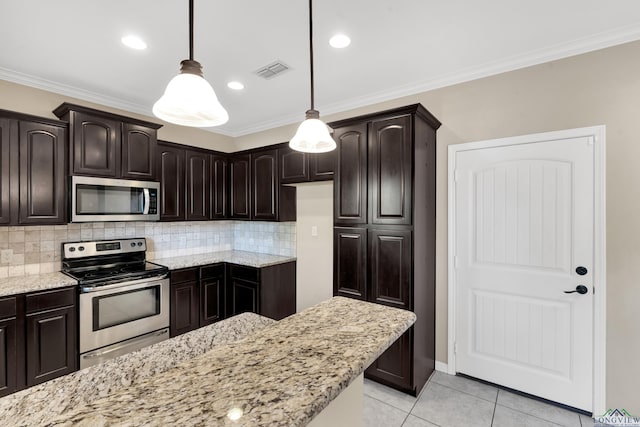 107 Lakeway Ln, Longview, TX 75604 - kitchen featuring appliances with stainless steel finishes, light stone countertops, light tile patterned floors, dark brown cabinetry, and decorative backsplash