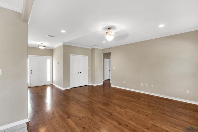 107 Lakeway Ln, Longview, TX 75604 - spare room featuring ceiling fan, baseboards, wood finished floors, recessed lighting, and ornamental molding