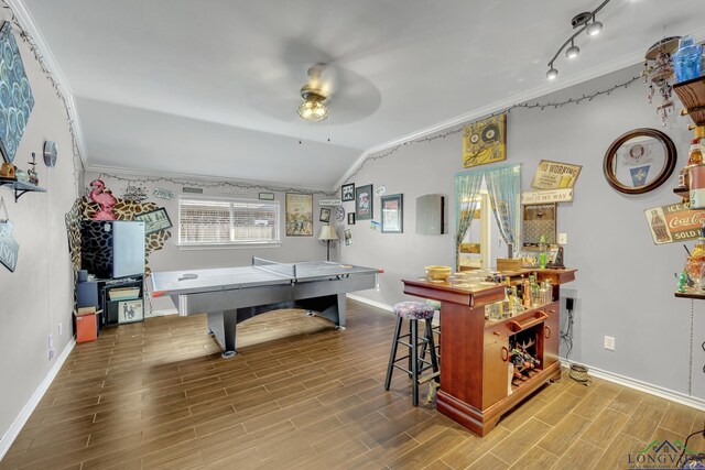 406 Alta St, Longview, TX 75604 - game room with lofted ceiling, baseboards, ceiling fan, and crown molding