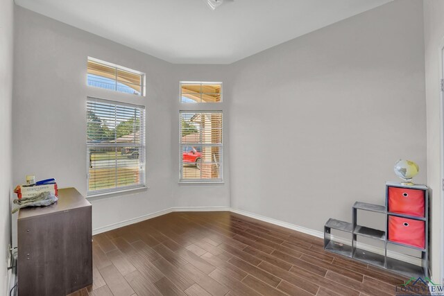 406 Alta St, Longview, TX 75604 - unfurnished room with dark wood finished floors and baseboards