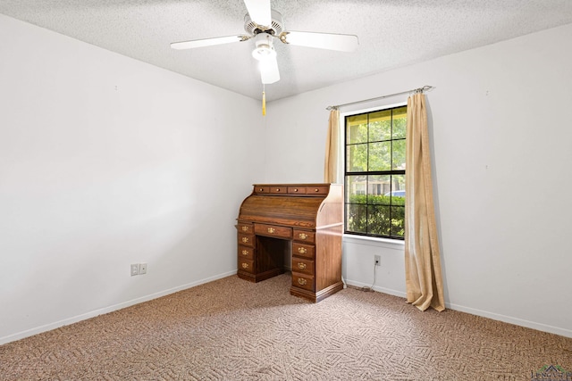 1205 Tiffany Ln, Longview, TX 75604 - unfurnished office with light carpet, a ceiling fan, and a textured ceiling