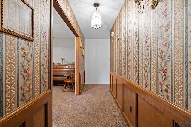 1205 Tiffany Ln, Longview, TX 75604 - hall featuring light colored carpet and a textured ceiling