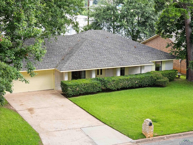 1205 Tiffany Ln, Longview, TX 75604 - ranch-style home with brick siding, a shingled roof, a front lawn, an attached garage, and concrete driveway