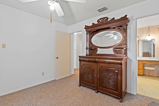 1205 Tiffany Ln, Longview, TX 75604 - hallway with light carpet and a textured ceiling