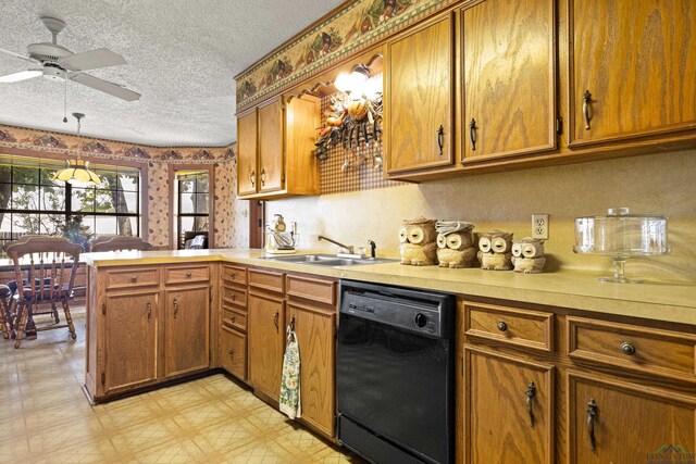 1205 Tiffany Ln, Longview, TX 75604 - kitchen featuring black dishwasher, brown cabinets, a peninsula, a textured ceiling, and light countertops