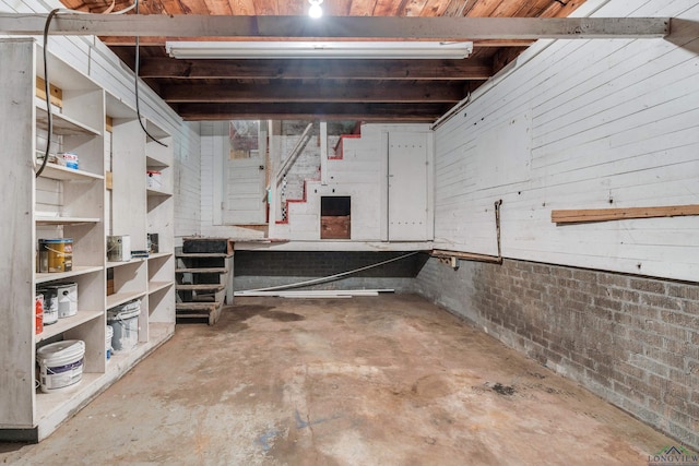1207 Lettie St, Longview, TX 75601 - below grade area with stairway and brick wall