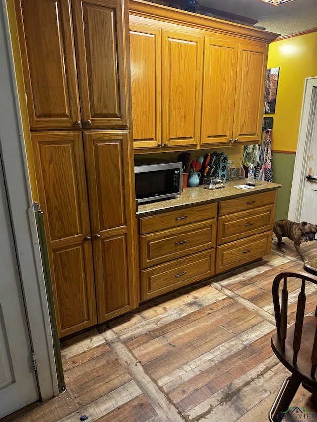 kitchen with light hardwood / wood-style floors