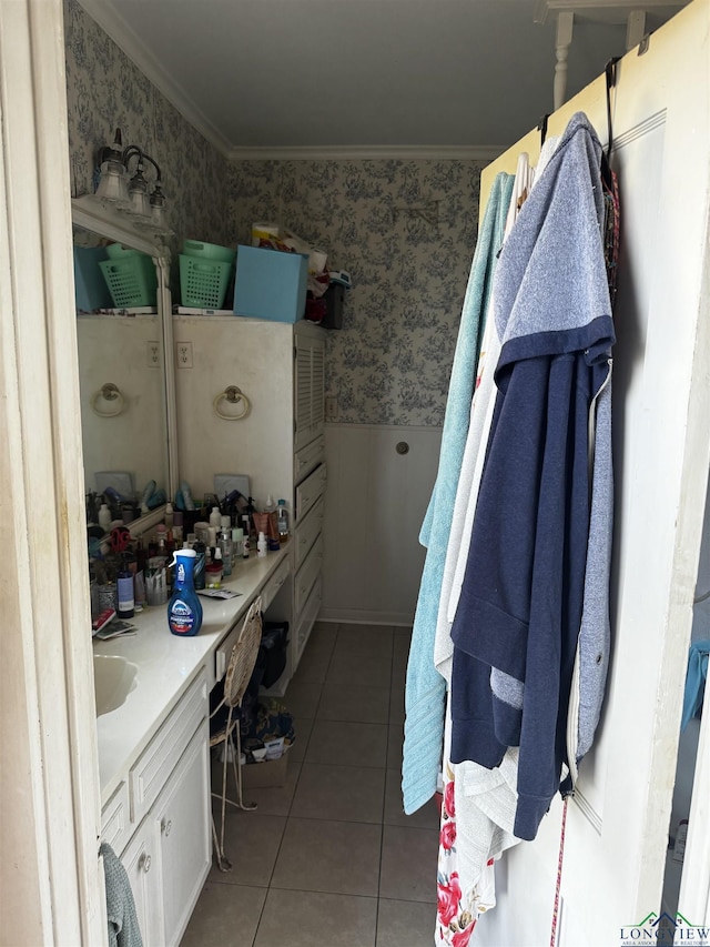 bathroom featuring tile patterned flooring and ornamental molding