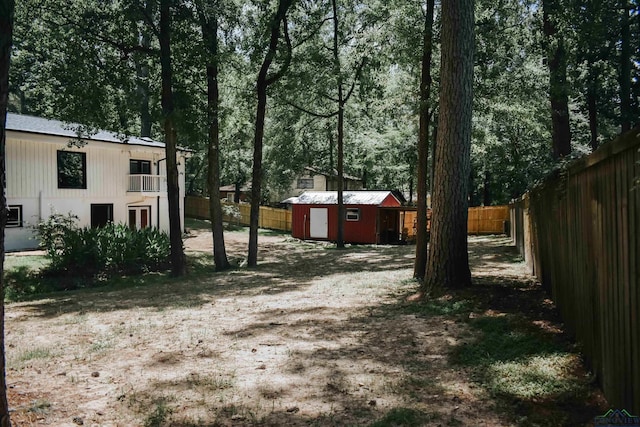 3515 Piping Rock St, Nacogdoches, TX 75965 - fenced backyard featuring a shed