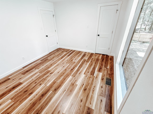 3515 Piping Rock St, Nacogdoches, TX 75965 - empty room featuring wood finished floors and baseboards
