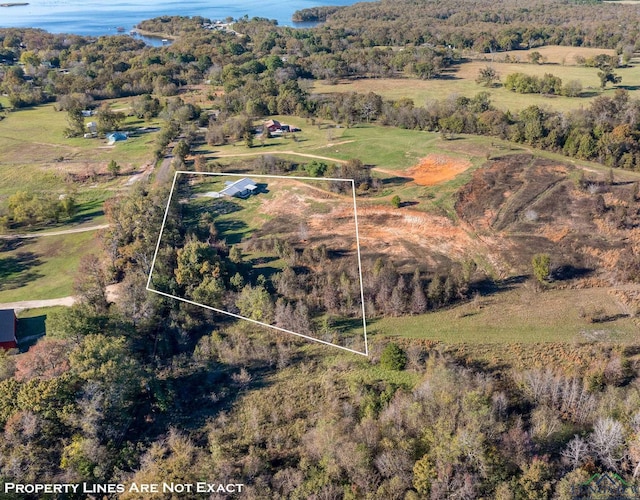 birds eye view of property featuring a rural view