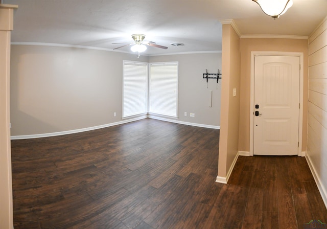 entryway with crown molding, dark wood-type flooring, and ceiling fan