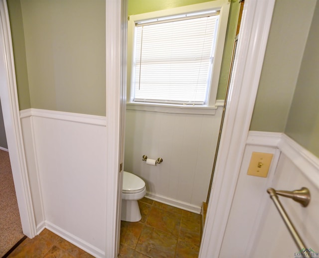 bathroom featuring toilet