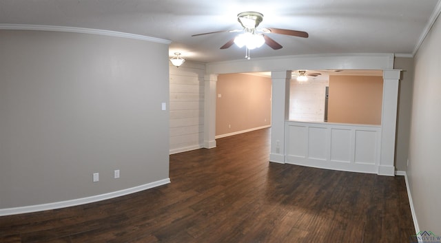 unfurnished room with ceiling fan, ornamental molding, dark hardwood / wood-style flooring, and ornate columns