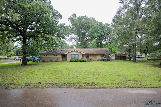 604 Kay Ct, Longview, TX 75601 - ranch-style home with a front lawn