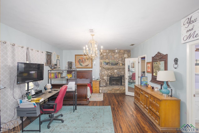 604 Kay Ct, Longview, TX 75601 - office featuring dark wood-type flooring, a chandelier, and a fireplace