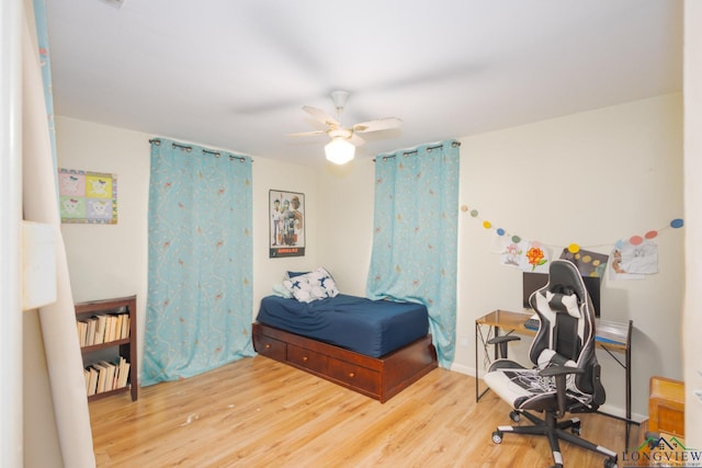 604 Kay Ct, Longview, TX 75601 - bedroom with wood finished floors and ceiling fan
