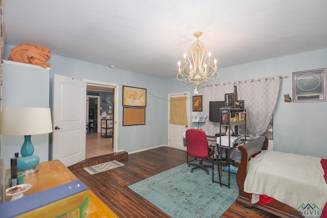 604 Kay Ct, Longview, TX 75601 - bedroom featuring a chandelier and wood finished floors