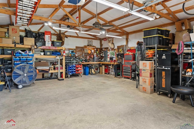 garage with a workshop area