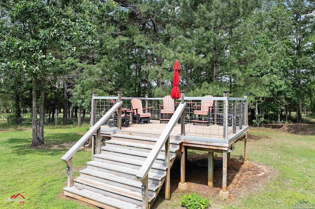 wooden deck with a lawn and stairs