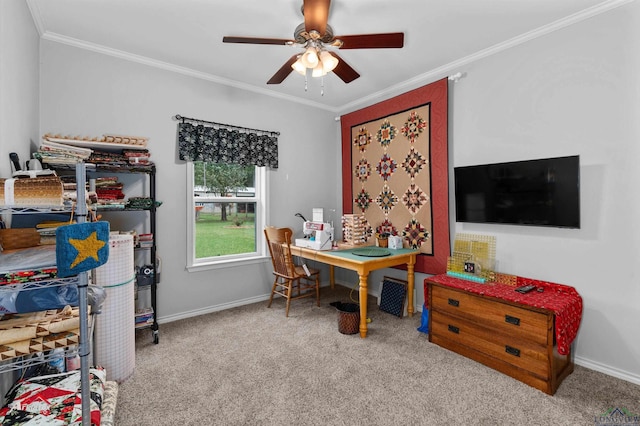 carpeted office space with a ceiling fan, baseboards, and ornamental molding