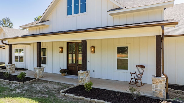 doorway to property featuring a porch