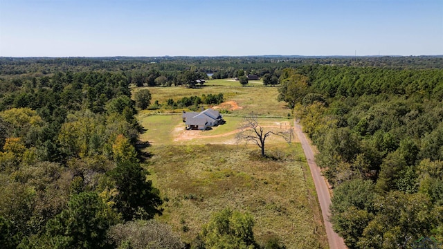 birds eye view of property featuring a rural view