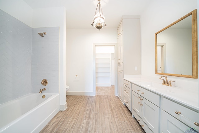 full bathroom with vanity, toilet, and bathing tub / shower combination