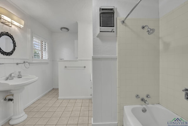 1900 W Hoyt Dr, Longview, TX 75601 - full bathroom featuring tile patterned floors, tub / shower combination, and wainscoting