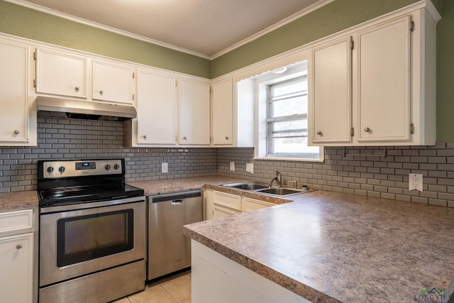 kitchen featuring white cabinetry, sink, crown molding, and appliances with stainless steel finishes