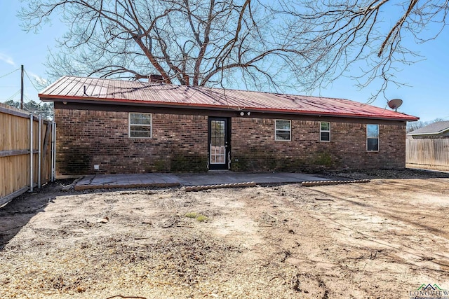 back of house with a patio area