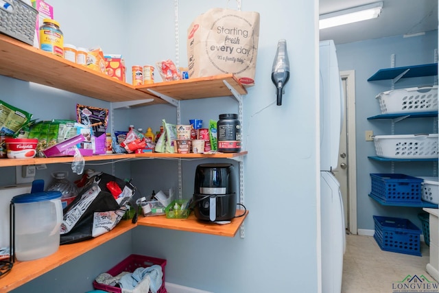 storage area featuring washer / clothes dryer